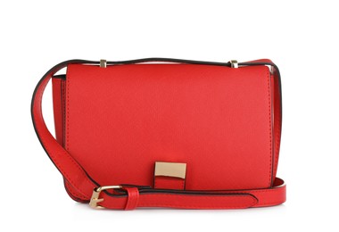 Red women's leather flap bag isolated on white