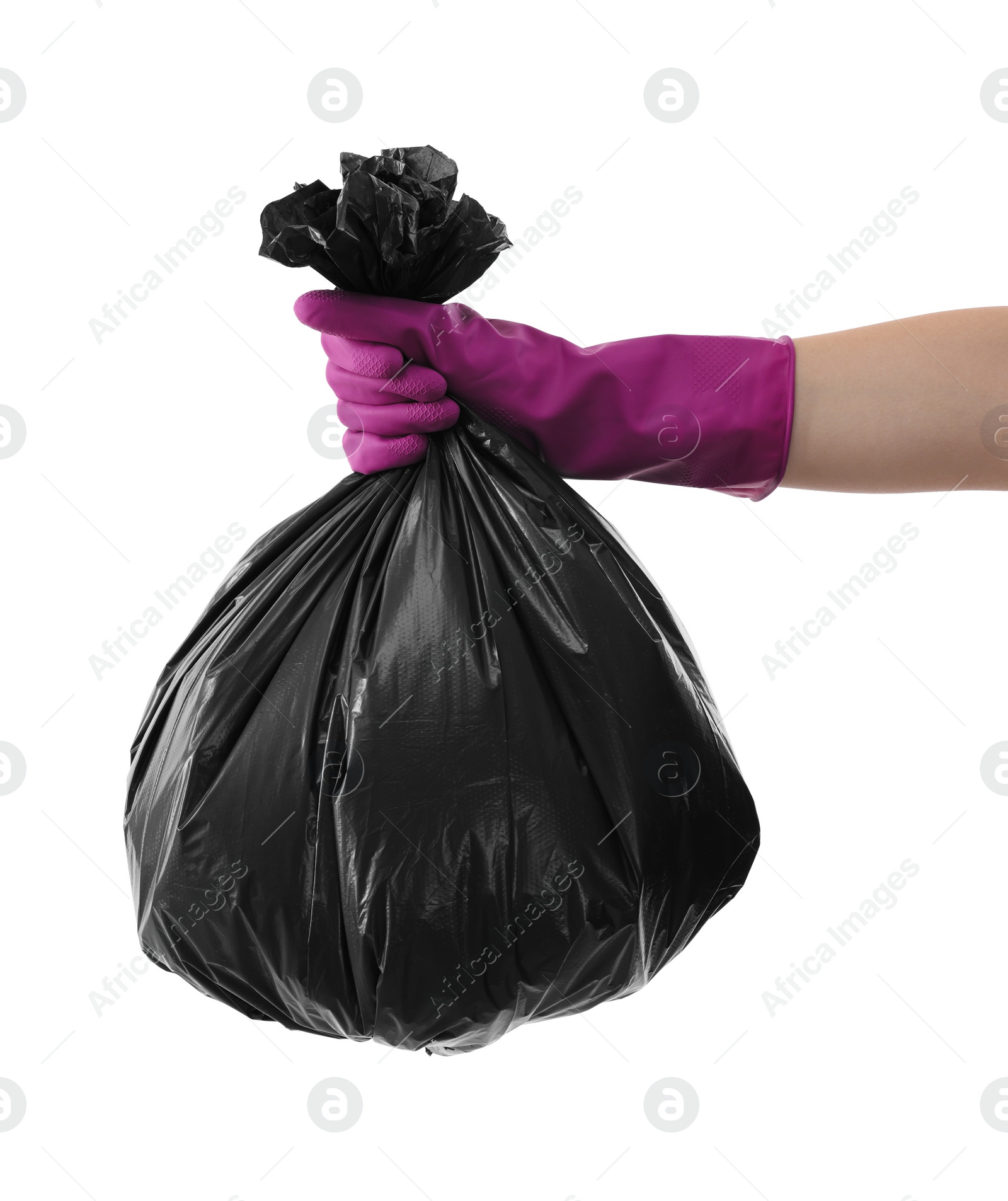 Photo of Woman holding plastic bag full of garbage on white background, closeup