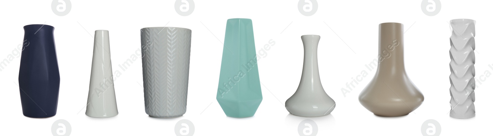 Image of Set of beautiful ceramic vases on white background. Banner design