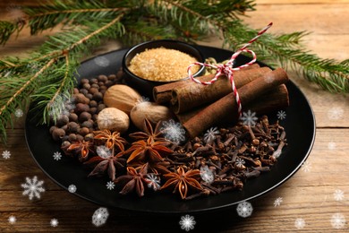 Different spices and fir tree branches on wooden table. Cinnamon, anise, cloves, allspice, nutmegs, brown sugar, cardamom