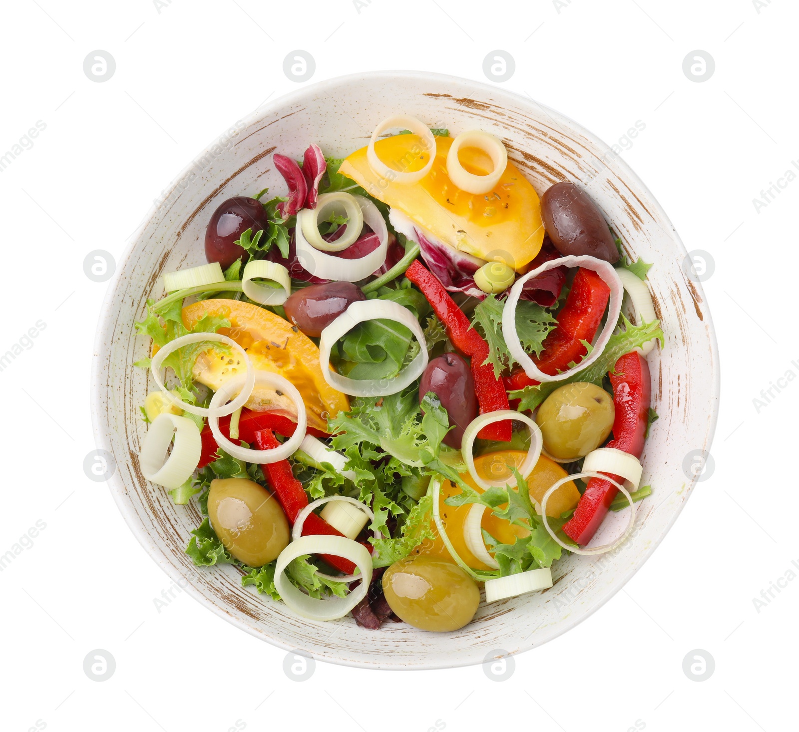 Photo of Bowl of tasty salad with leek and olives isolated on white, top view