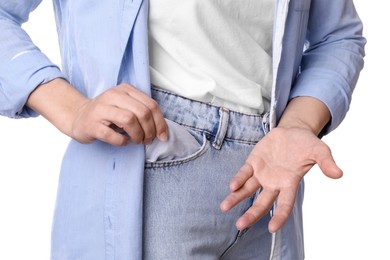 Photo of Poor woman showing empty pocket on white background, closeup