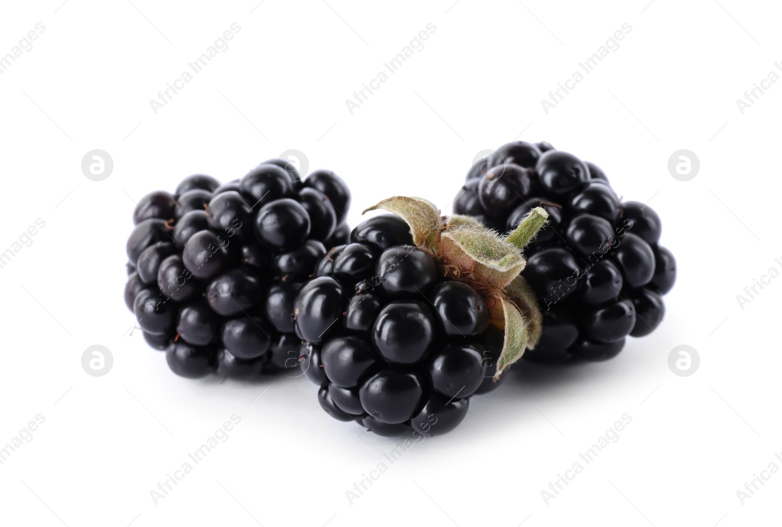Photo of Delicious fresh ripe blackberries isolated on white