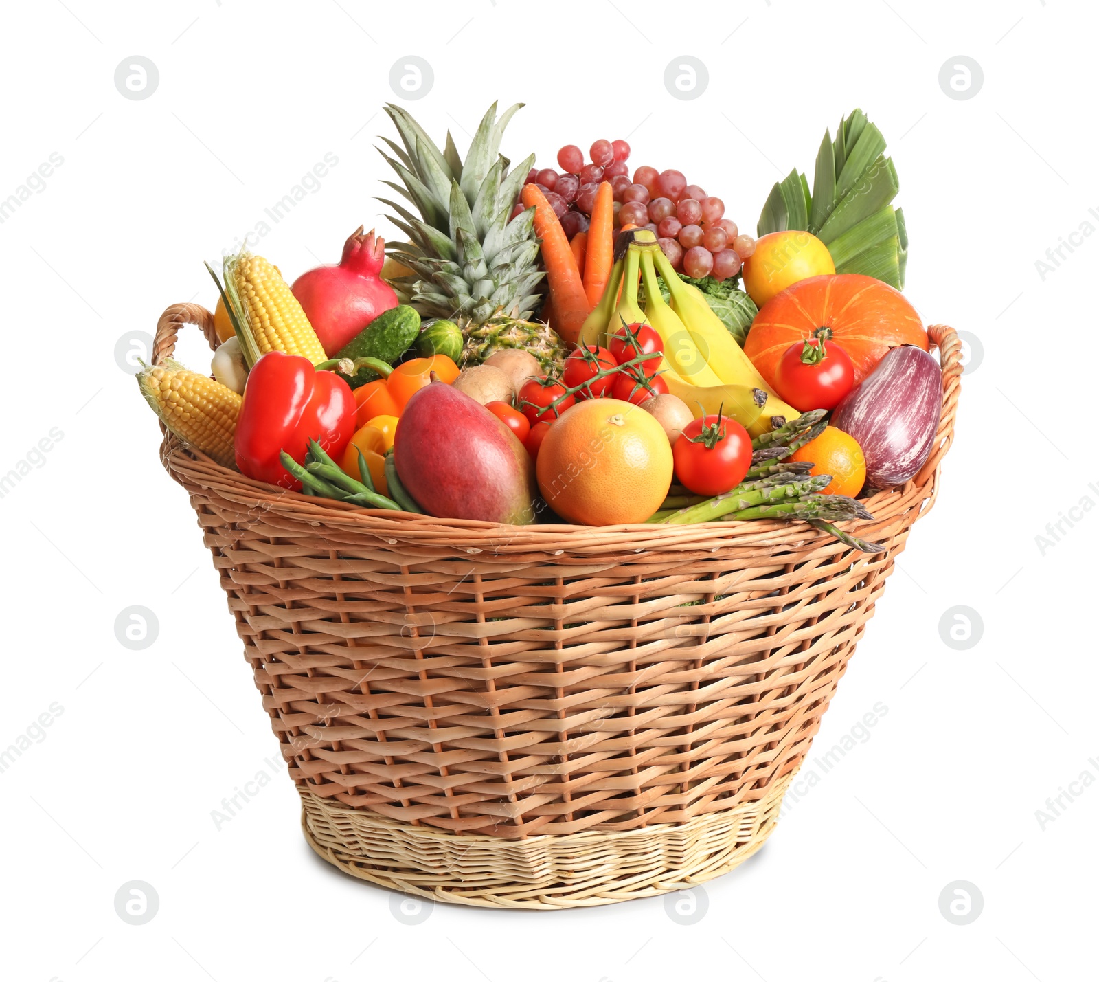 Photo of Basket with assortment of fresh organic fruits and vegetables on white background