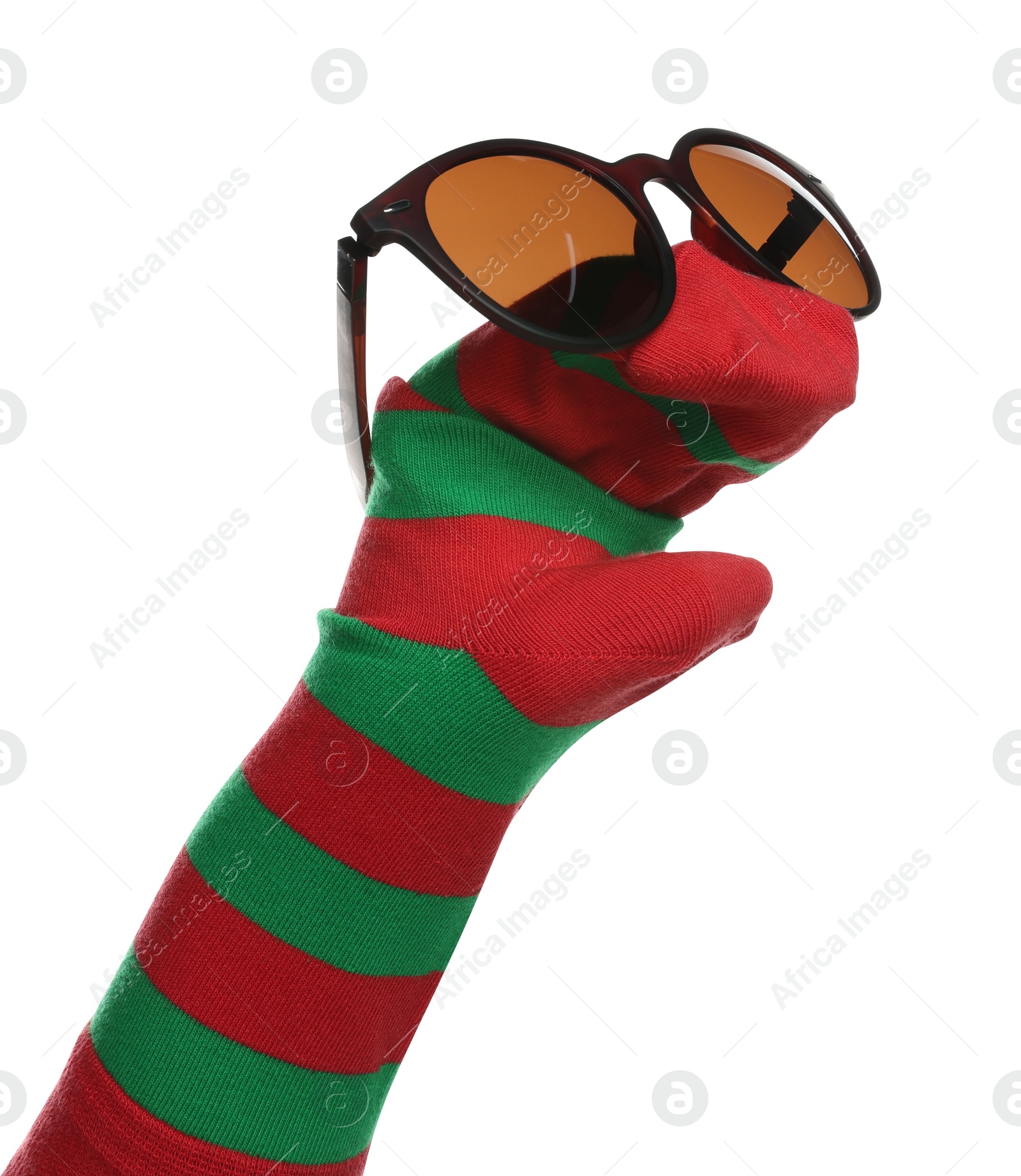 Photo of Funny sock puppet with sunglasses isolated on white