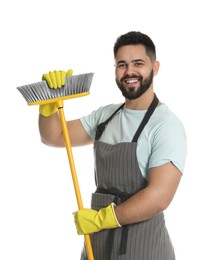 Photo of Young man with yellow broom on white background