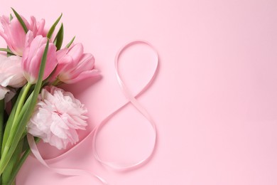 Photo of 8th of March greeting card design with ribbon, beautiful flowers and space for text on pink background, flat lay. International Women's day