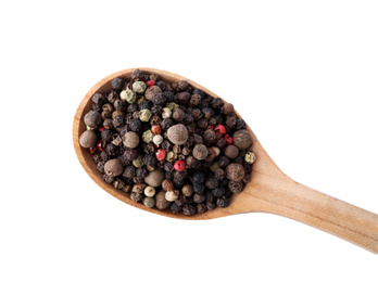 Pepper grains mix in wooden spoon isolated on white, top view