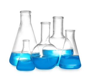 Laboratory glassware with liquid on white background. Solution chemistry