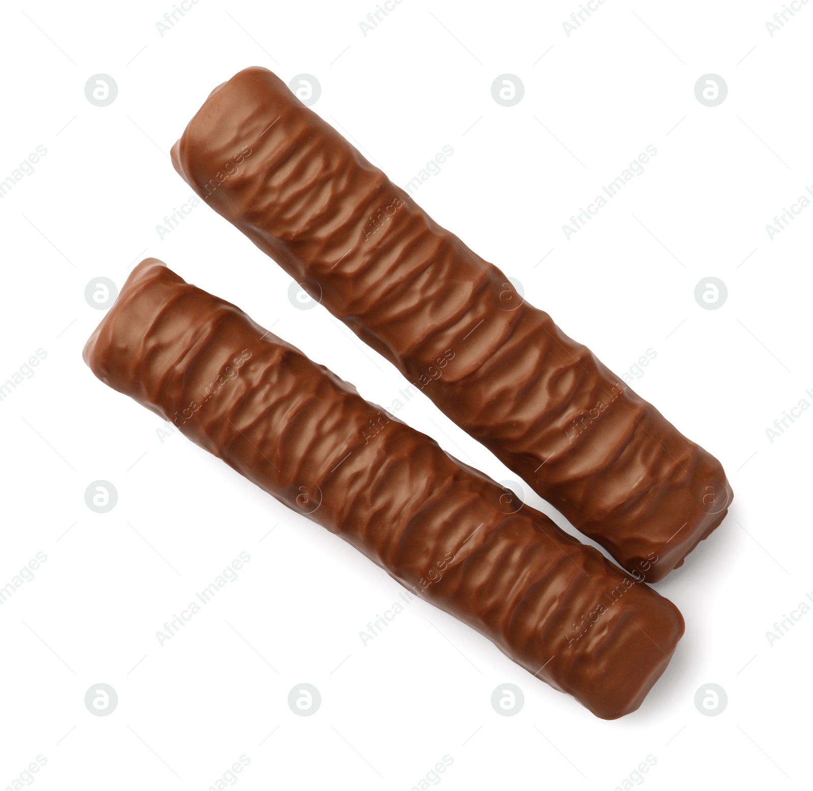 Photo of Sweet tasty chocolate bars on white background, top view