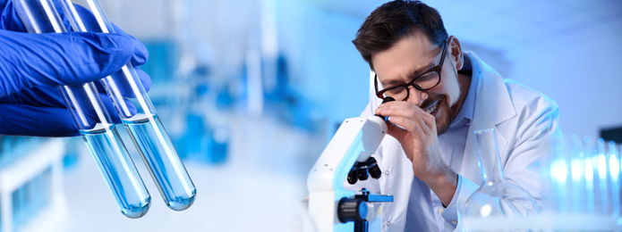 Image of Scientist using modern microscope and test tubes for analysis in laboratory. Banner design  