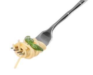 Fork with tasty pasta and basil isolated on white