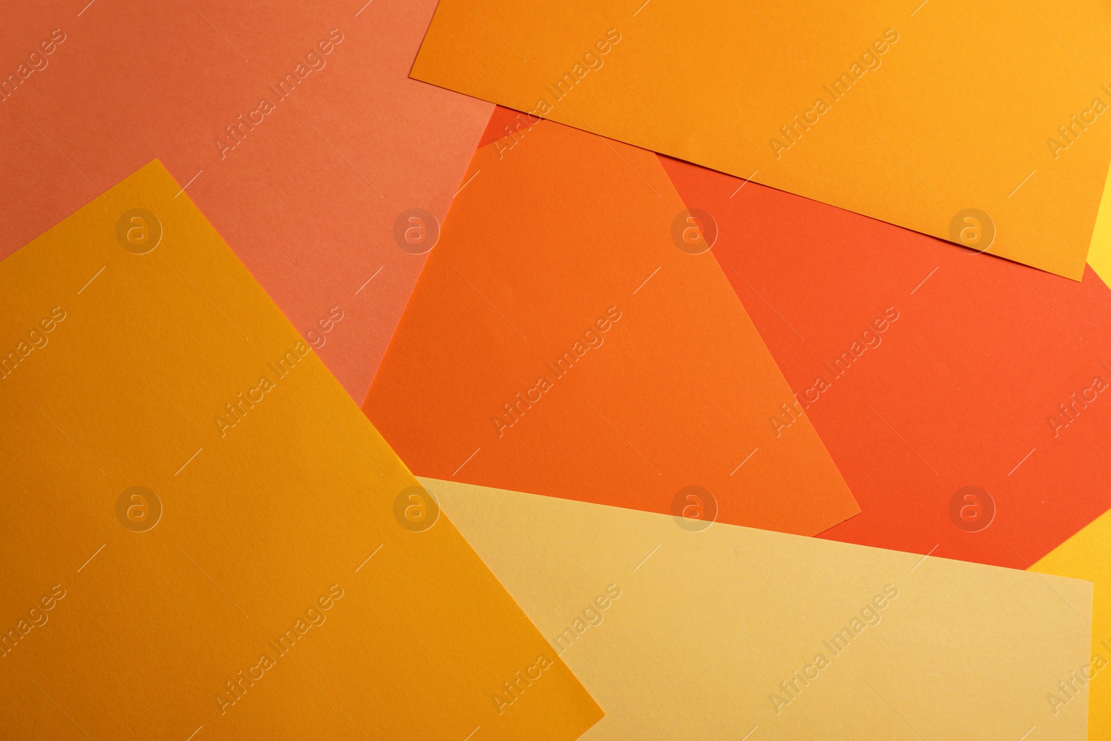 Photo of Sheets of colorful paper as background, top view