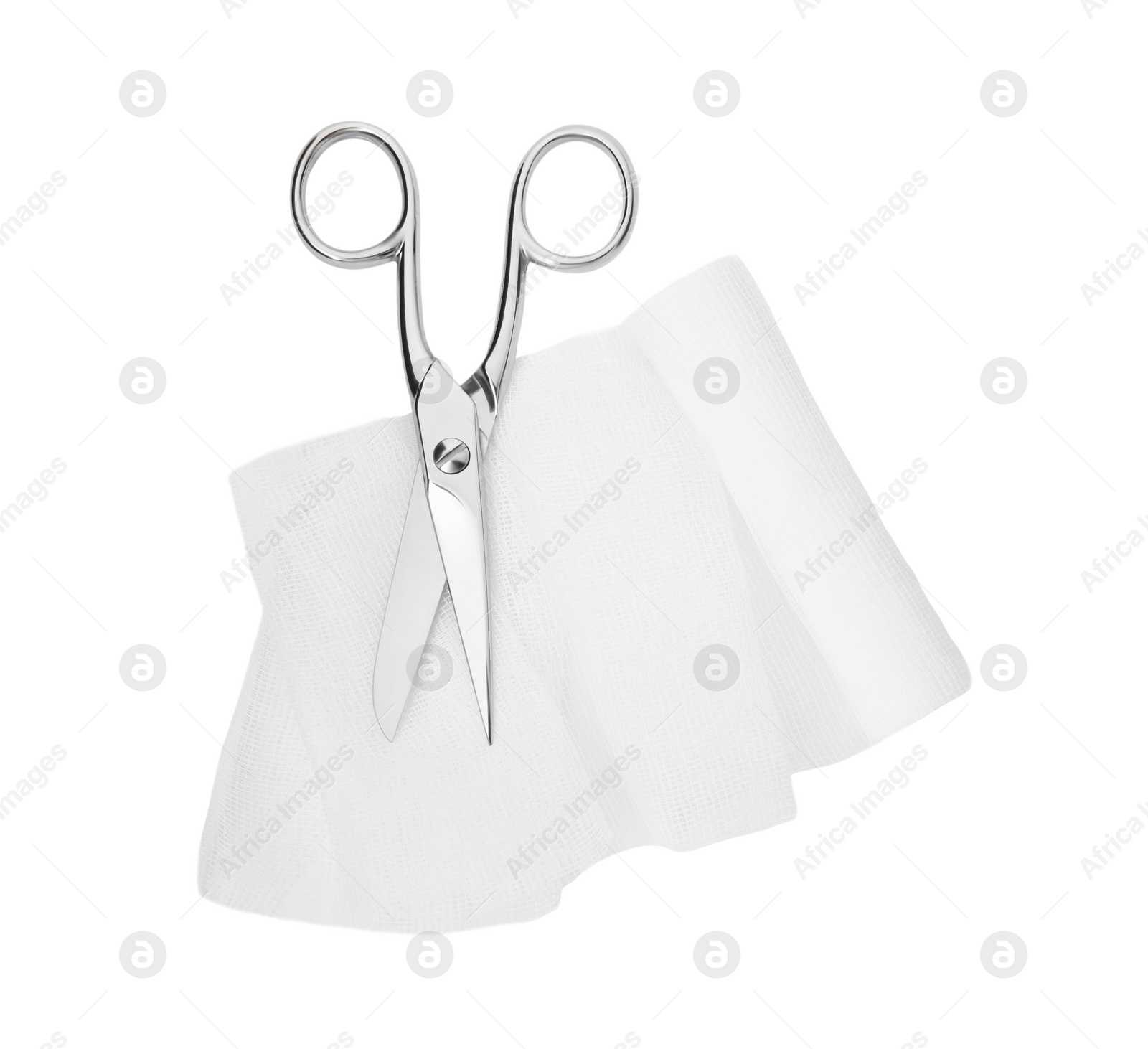 Photo of Medical bandage and scissors on white background, top view