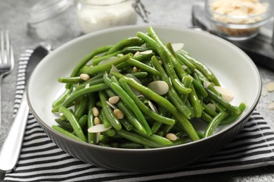 Tasty salad with green beans served on table