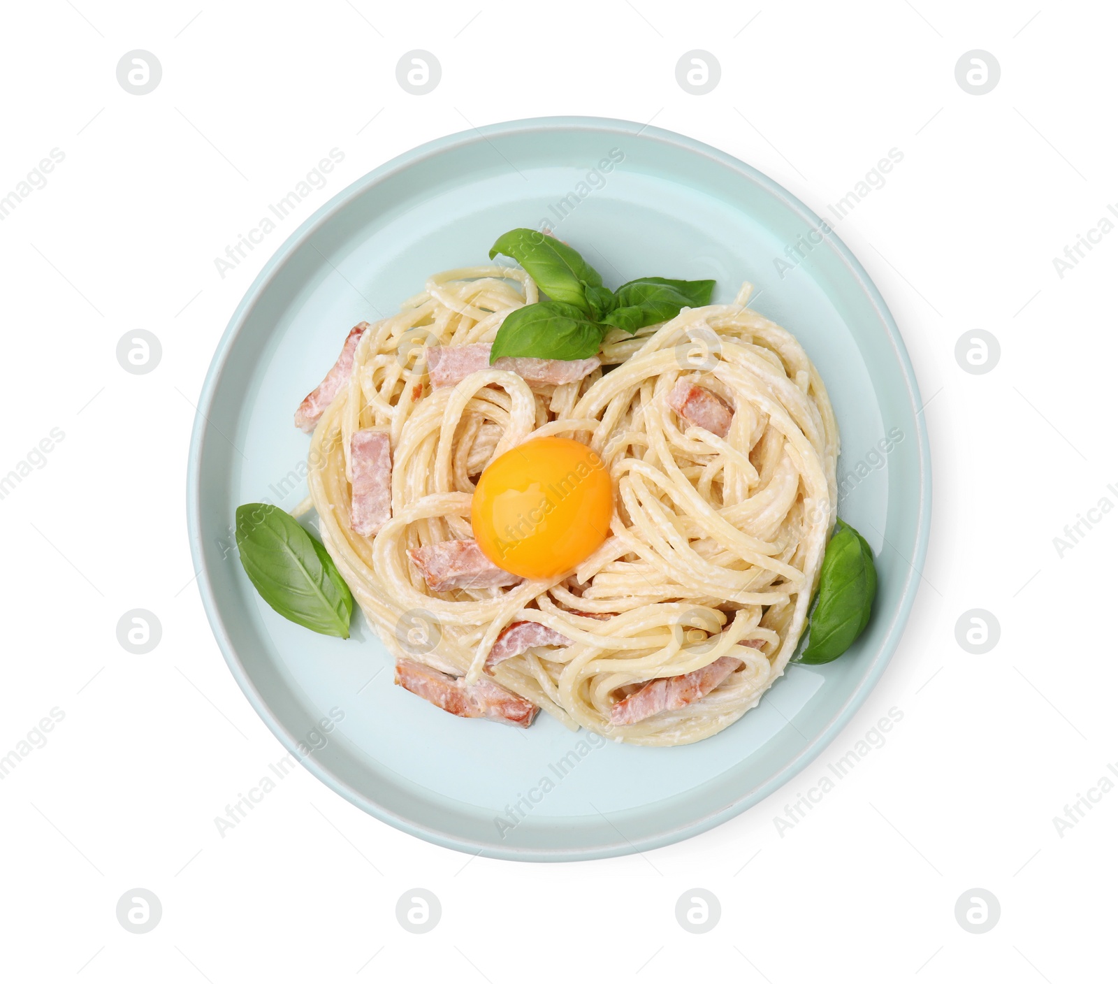 Photo of Plate of delicious pasta Carbonara with egg yolk isolated on white, top view