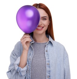 Happy woman with purple balloon on white background