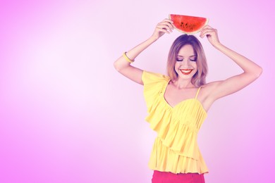 Pretty young woman with juicy watermelon on color background, space for text. Summer party