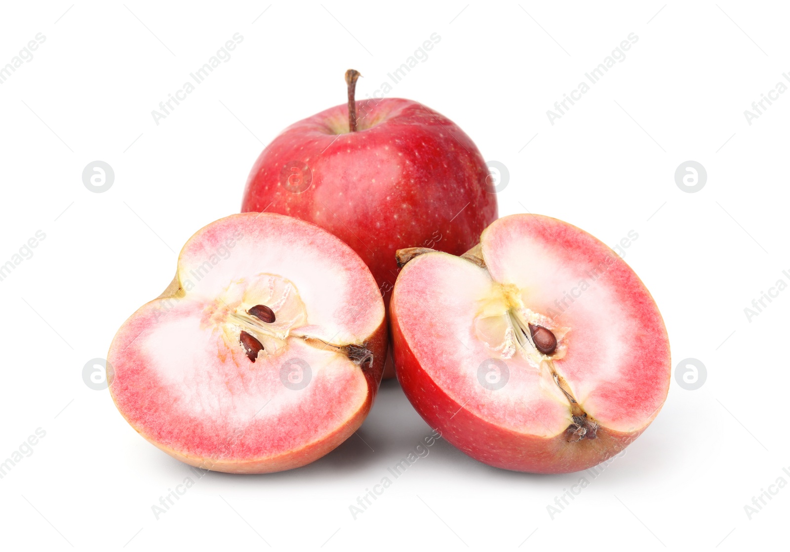 Photo of Tasty apples with red pulp isolated on white