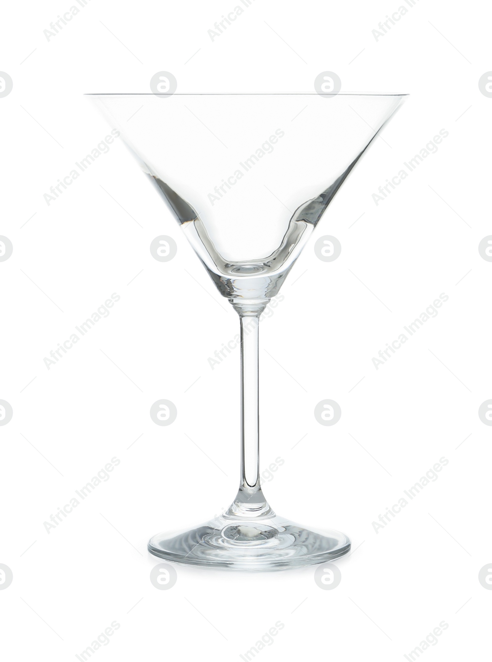 Photo of Empty clear martini glass isolated on white