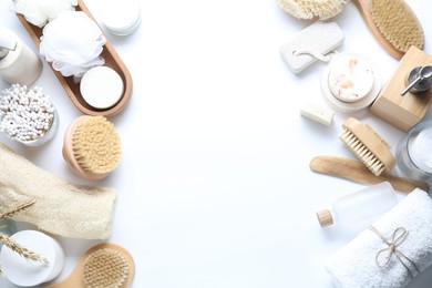 Bath accessories. Flat lay composition with personal care products on white background, space for text