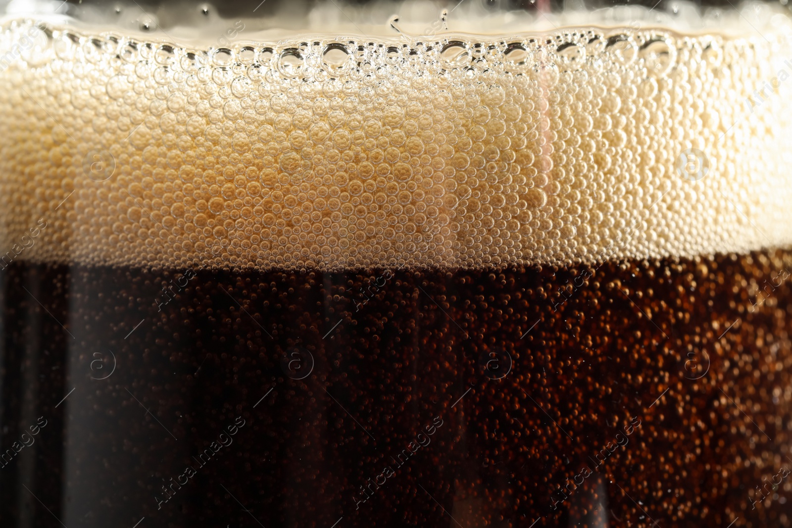 Photo of Glass of refreshing soda drink as background, closeup