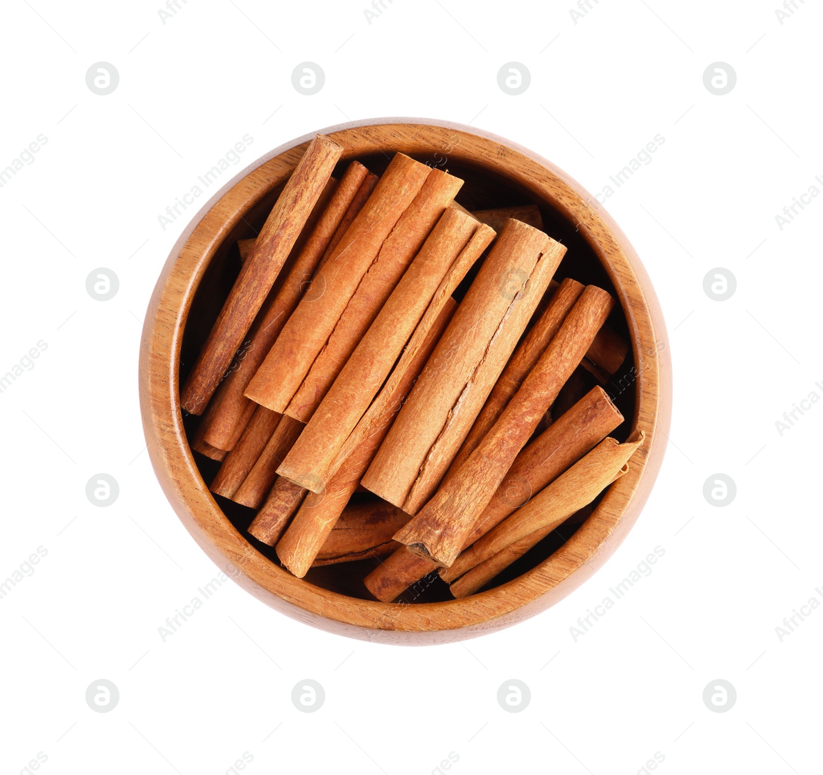 Photo of Cinnamon sticks in bowl isolated on white, top view