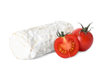 Photo of Delicious fresh goat cheese with cherry tomatoes on white background
