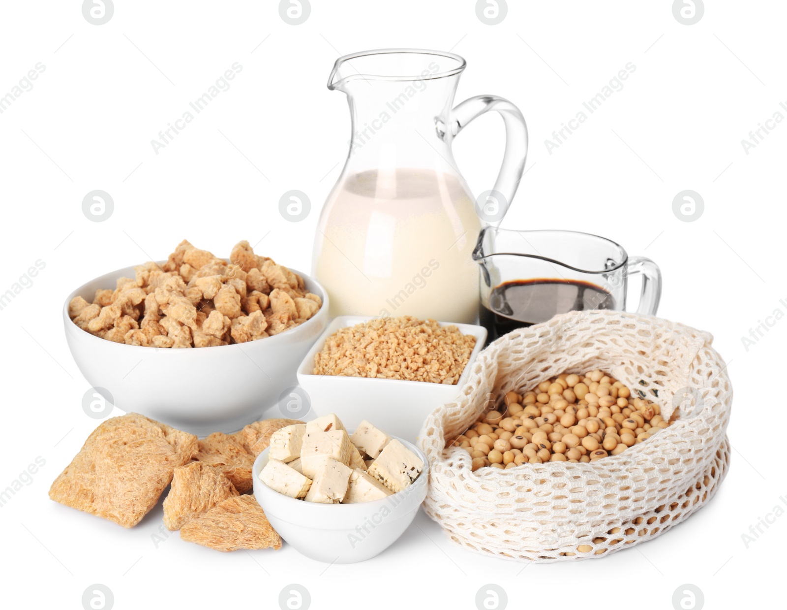Photo of Different organic soy products on white background