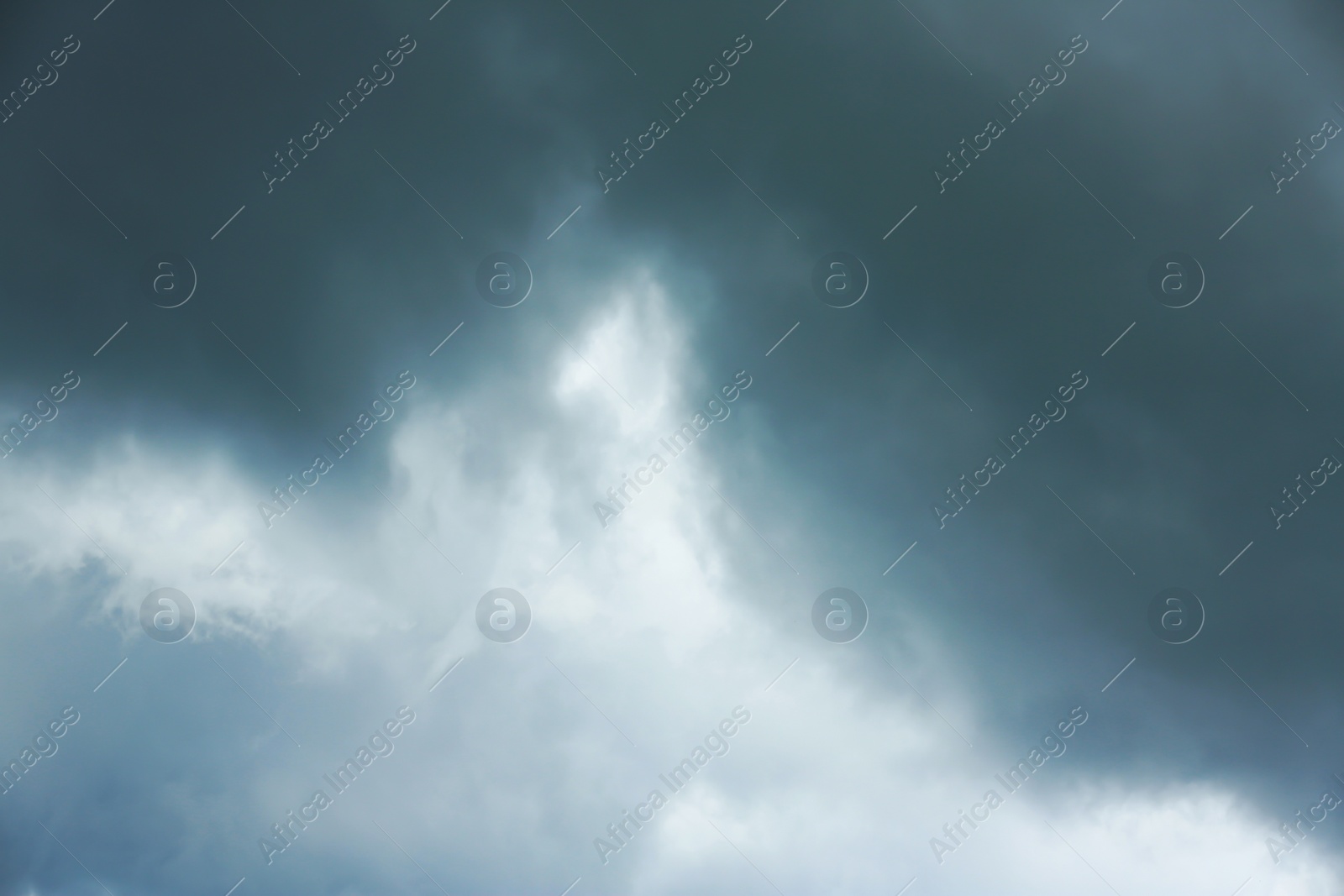 Photo of Sky with heavy rainy clouds on grey day