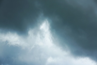 Photo of Sky with heavy rainy clouds on grey day