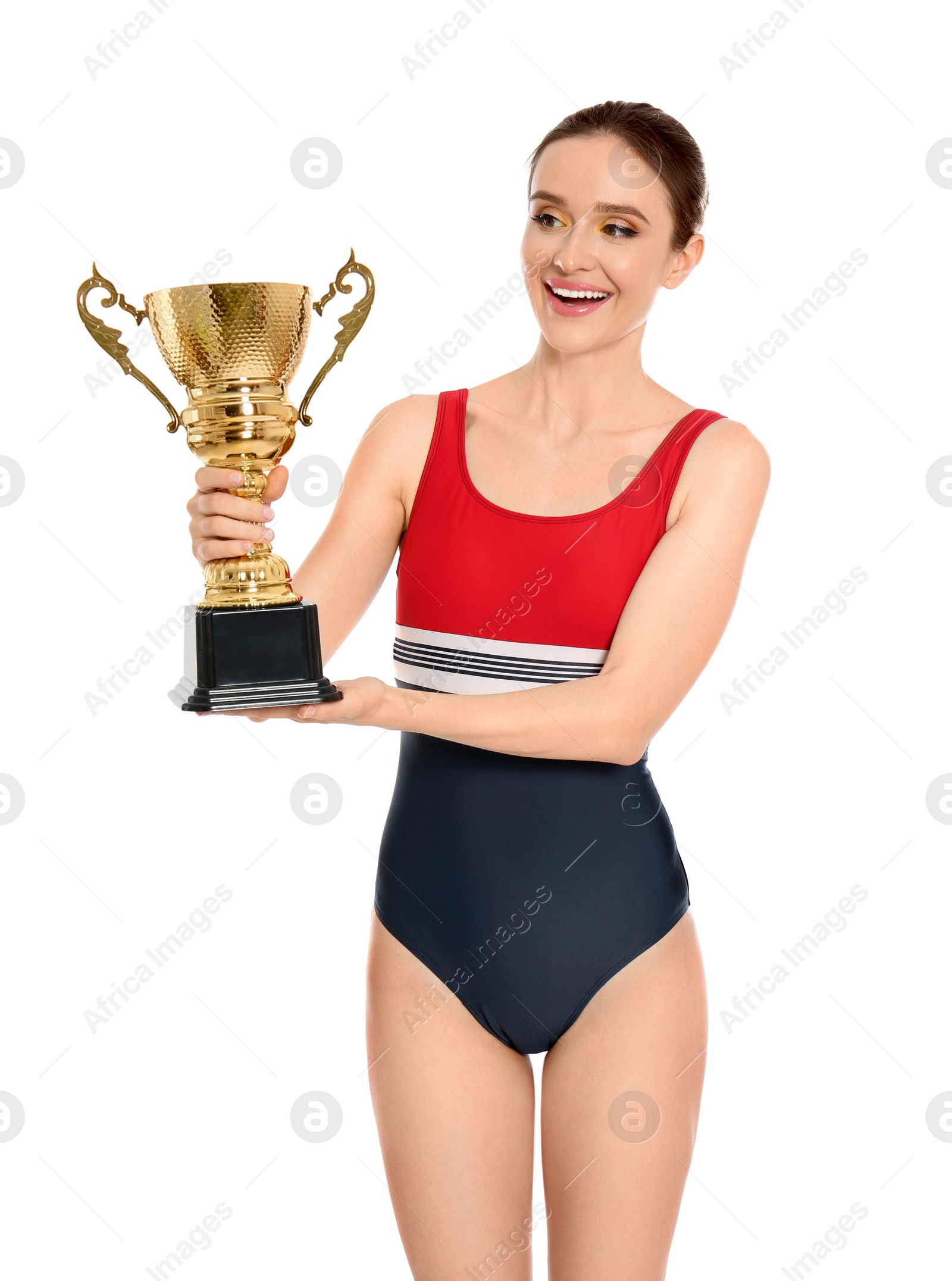 Photo of Young woman in swimwear holding golden cup on white background