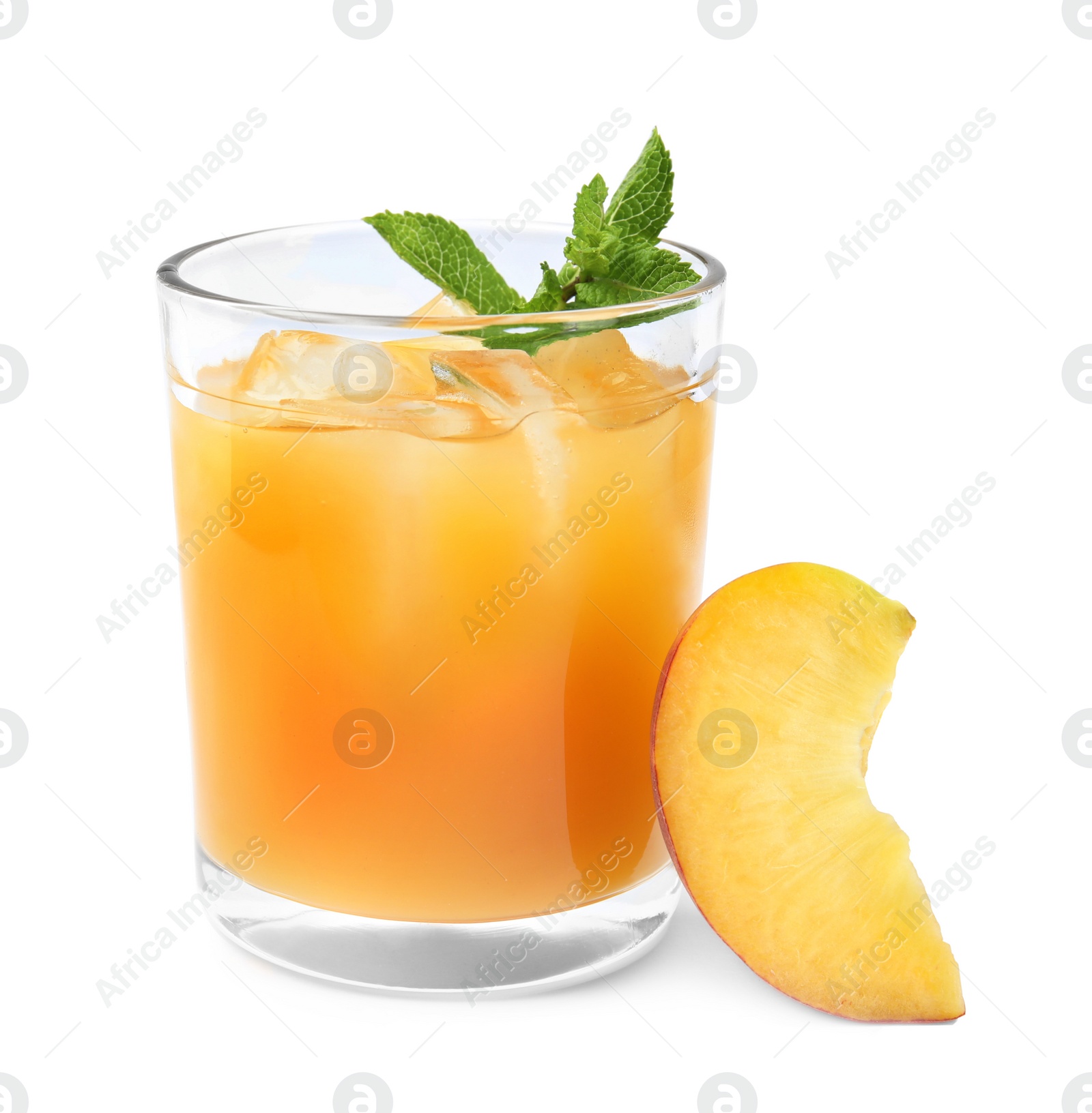 Photo of Delicious refreshing peach cocktail in glass and fresh fruit on white background