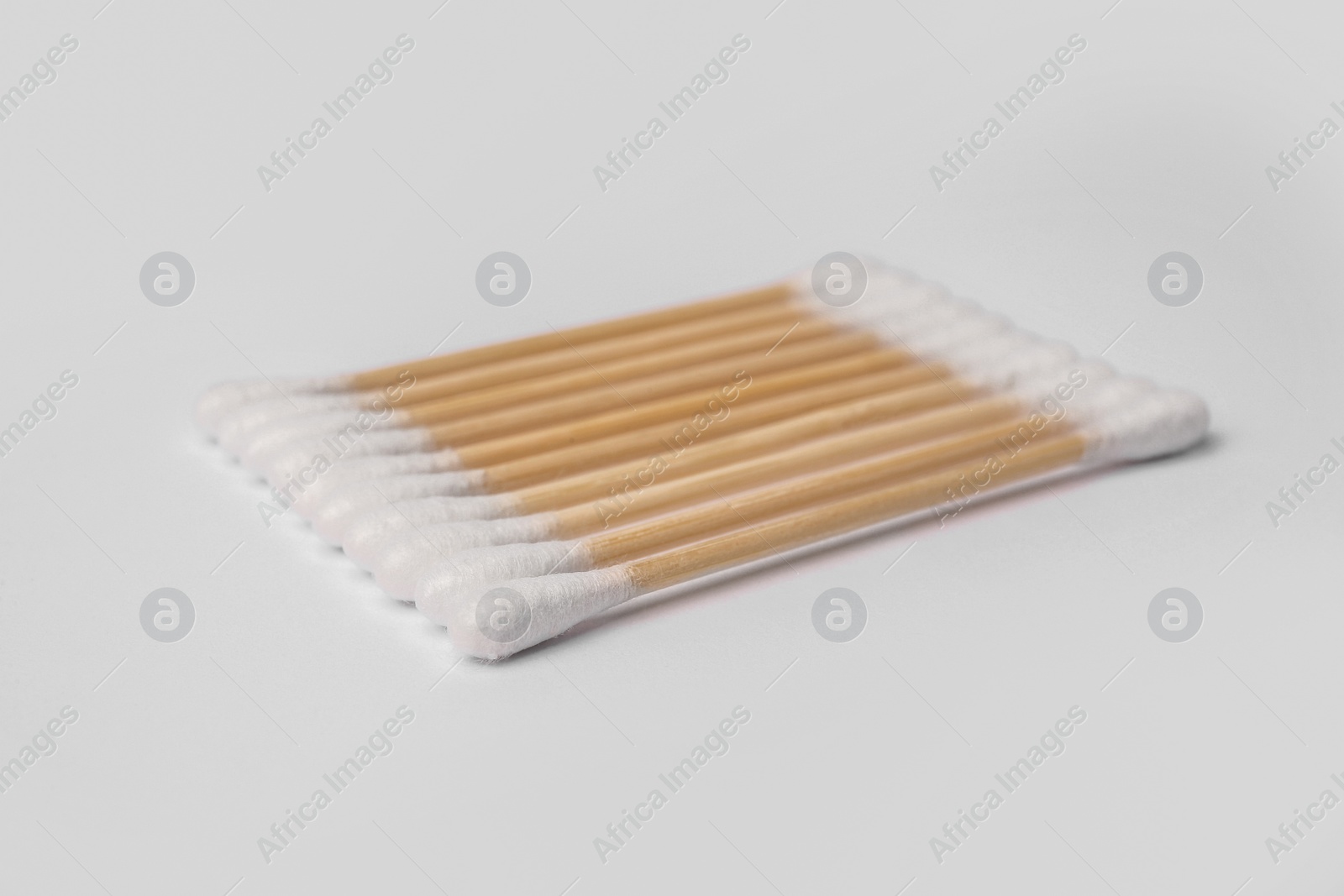 Photo of Many clean cotton buds isolated on white