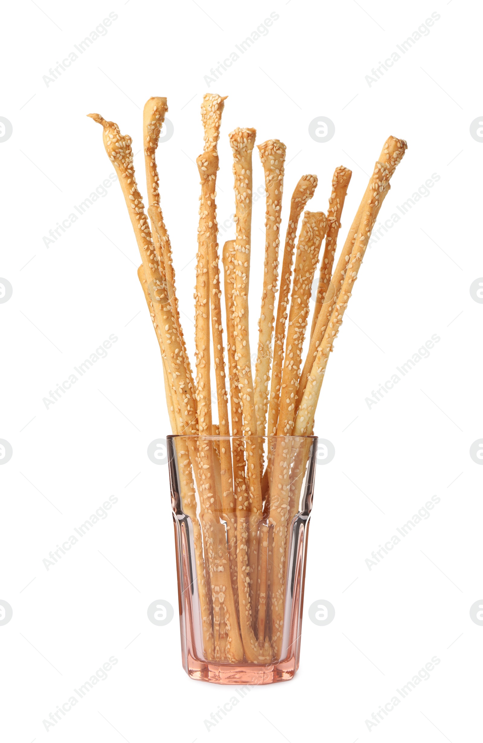 Photo of Delicious grissini sticks in glass on white background