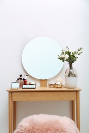 Photo of Stylish room interior with wooden dressing table