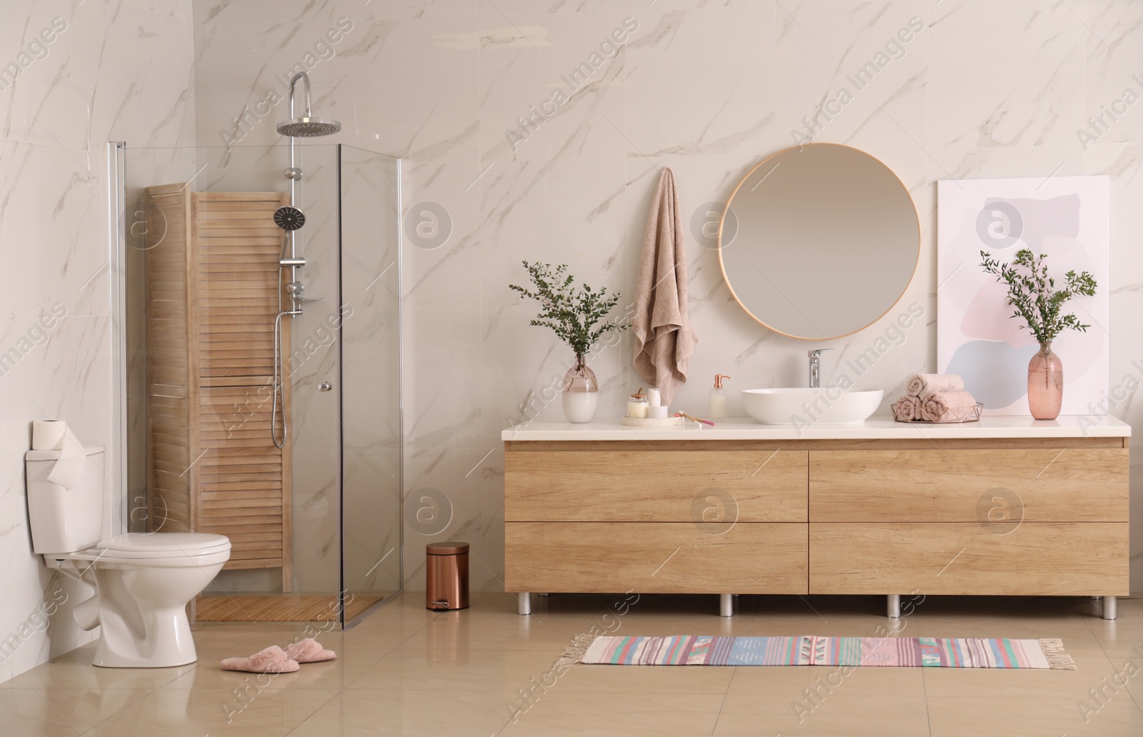 Photo of Modern bathroom interior with stylish mirror and vessel sink