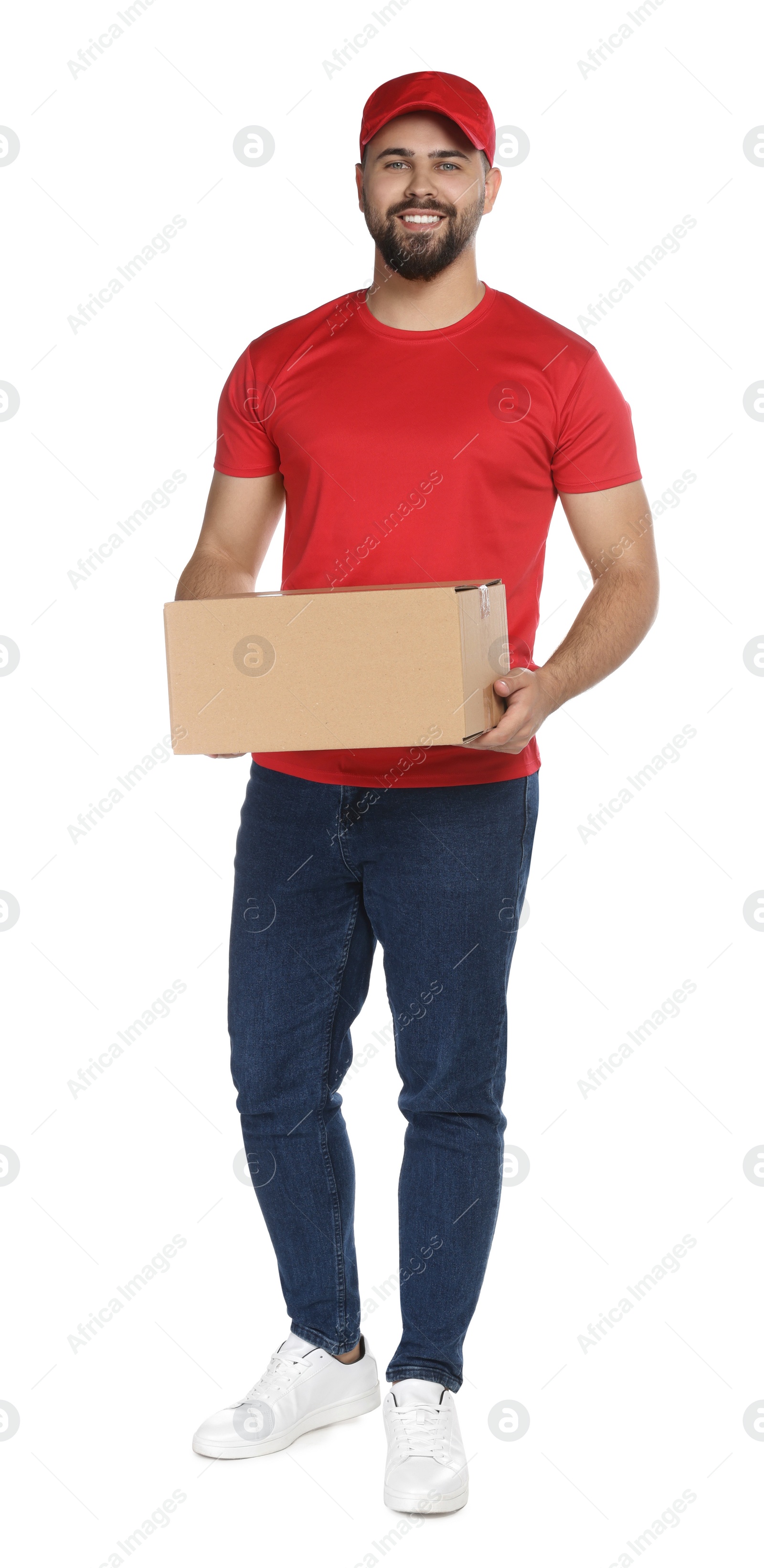 Photo of Happy young courier with cardboard box on white background