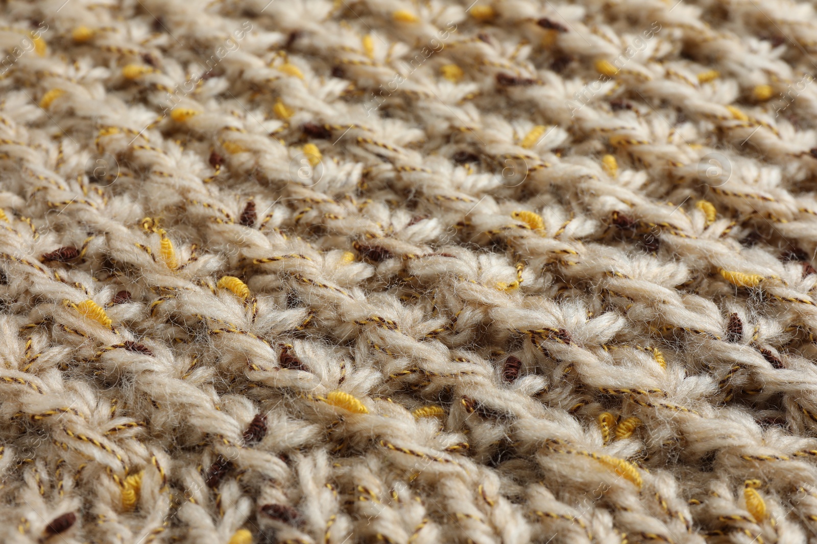 Photo of Texture of knitted fabric as background, closeup