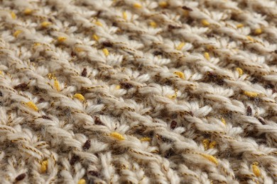 Photo of Texture of knitted fabric as background, closeup