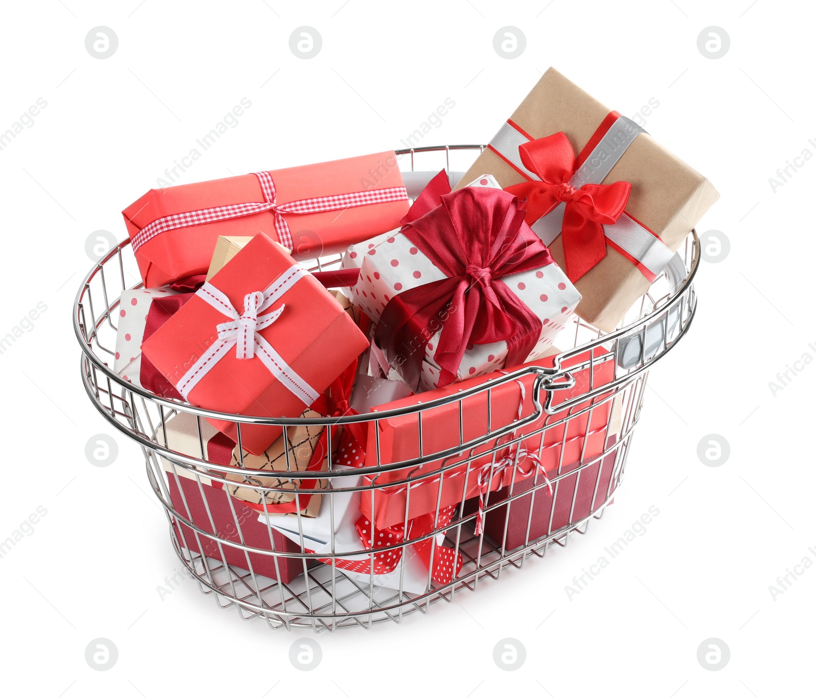 Photo of Shopping basket full of gift boxes on white background