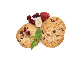 Photo of Cookies with freeze dried fruits and mint isolated on white, top view