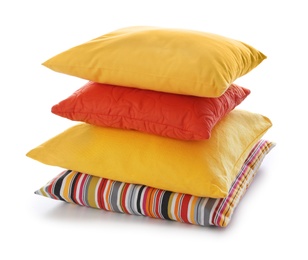 Stack of different colorful pillows on white background