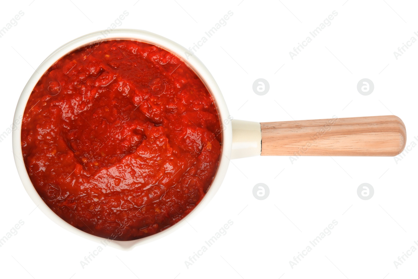 Photo of Delicious tomato sauce in pan isolated on white, top view