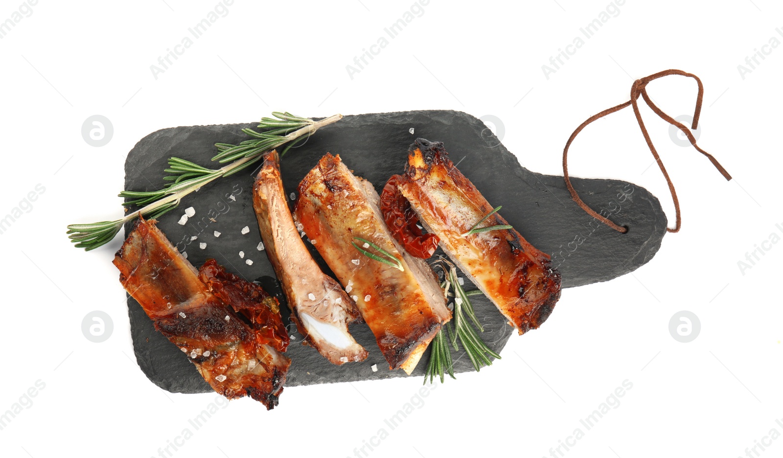 Photo of Tasty grilled ribs isolated on white, top view