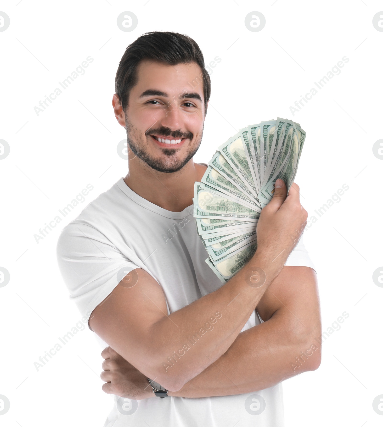 Photo of Handsome young man with dollars on white background