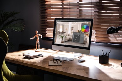 Designer's workplace. Computer with photo editor application on table indoors