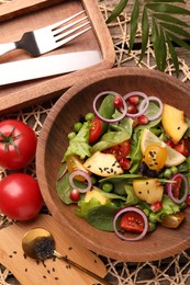 Photo of Delicious salad with peach, green peas and vegetables served on table, flat lay