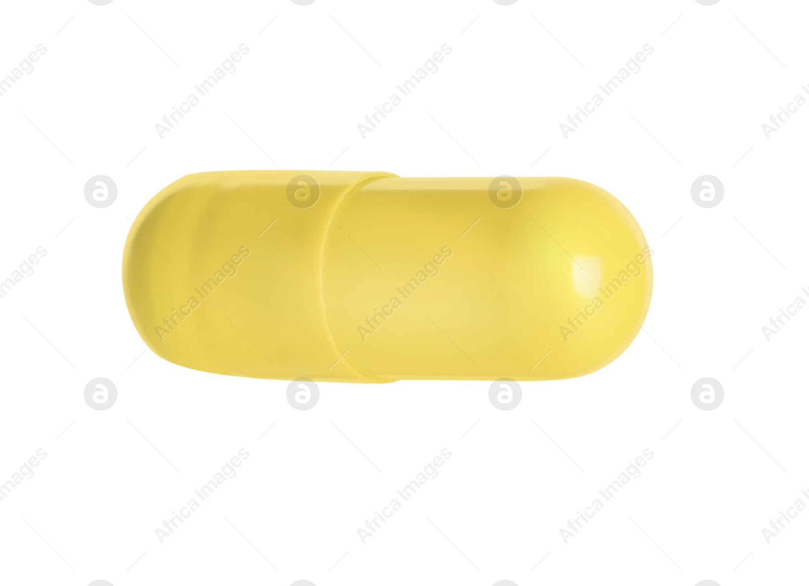 Photo of One yellow pill isolated on white. Medicinal treatment