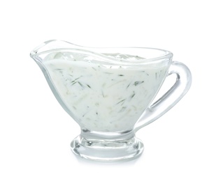 Photo of Glass gravy boat with cucumber sauce on white background